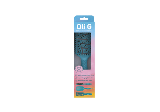 Oli G Detangling Brush — hollow design, top view
